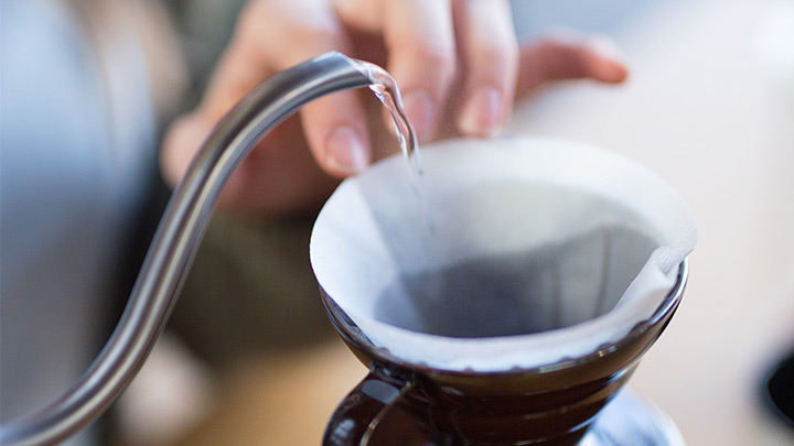 Rinse the Hario V60 paper filter with hot water